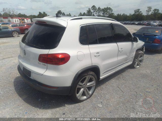 Volkswagen Tiguan 2013 VIN WVGAV3AX1EW038579 фото оголошення 40 з 73