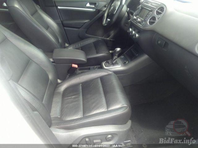 Volkswagen Tiguan 2013 VIN WVGAV3AX1EW038579 фото оголошення 39 з 73