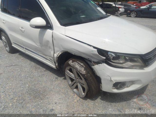 Volkswagen Tiguan 2013 VIN WVGAV3AX1EW038579 фото оголошення 38 з 73