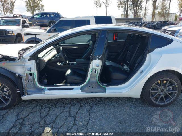 Tesla Model 3 2022 VIN 5YJ3E1EB0NF169538 фото оголошення 22 з 41