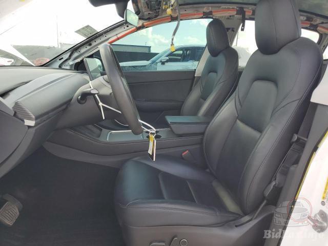 Tesla Model Y 2021 VIN 5YJYGDEE9MF209321 фото оголошення 34 з 59
