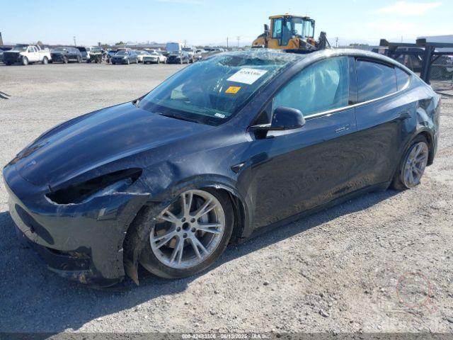Tesla Model Y 2024 VIN 7SAYGDED1RF053597 фото оголошення 53 з 66