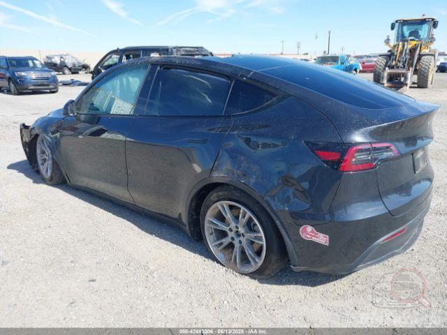 Tesla Model Y 2024 VIN 7SAYGDED1RF053597 фото оголошення 52 з 66