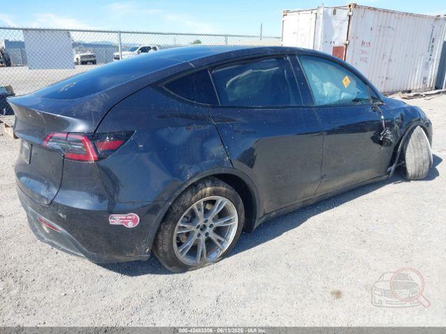 Tesla Model Y 2024 VIN 7SAYGDED1RF053597 фото оголошення 51 з 66