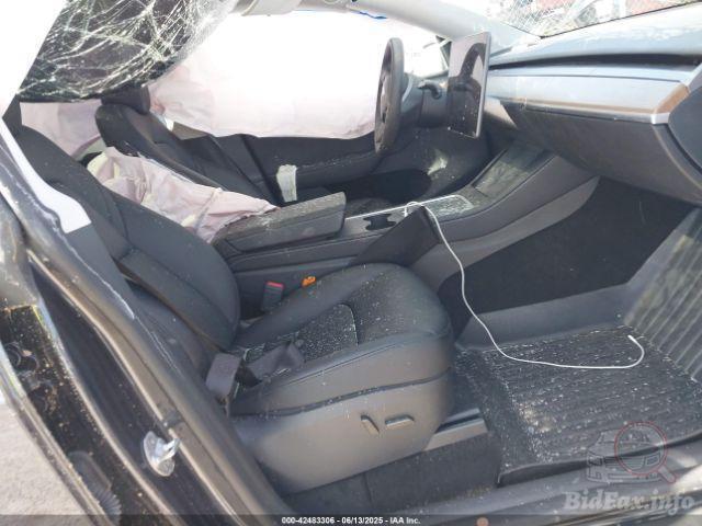 Tesla Model Y 2024 VIN 7SAYGDED1RF053597 фото оголошення 50 з 66