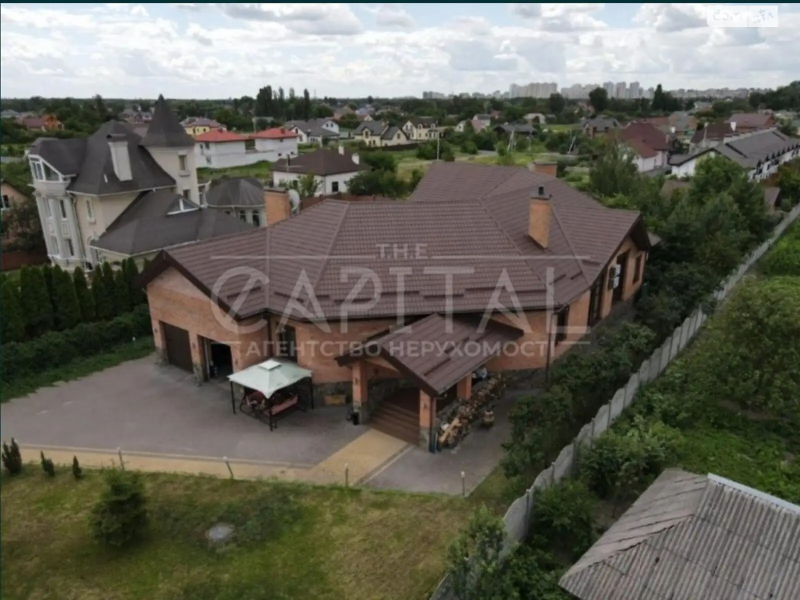 Сдается в аренду дом на 2 этажа 460 кв. м с гаражом, цена: 1800 $ - фото 1