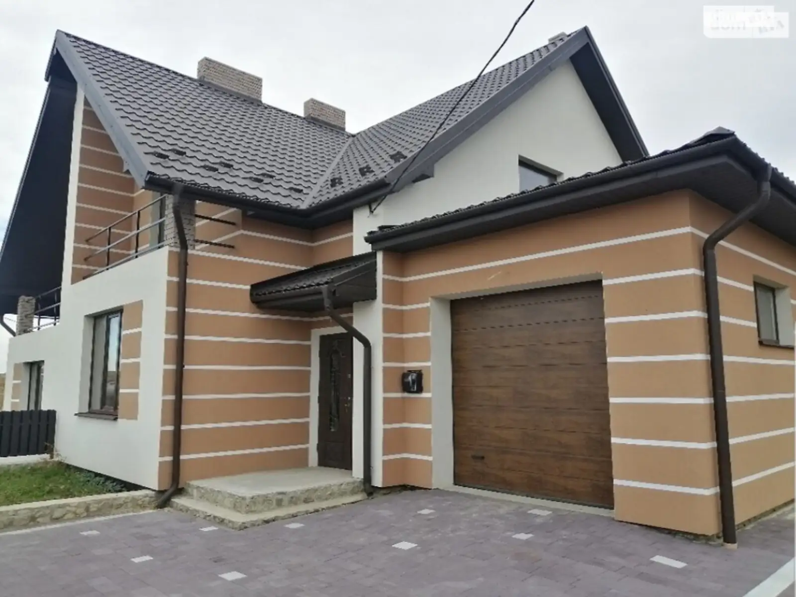 Продается дом на 2 этажа 137 кв. м с гаражом, цена: 78000 $ - фото 1