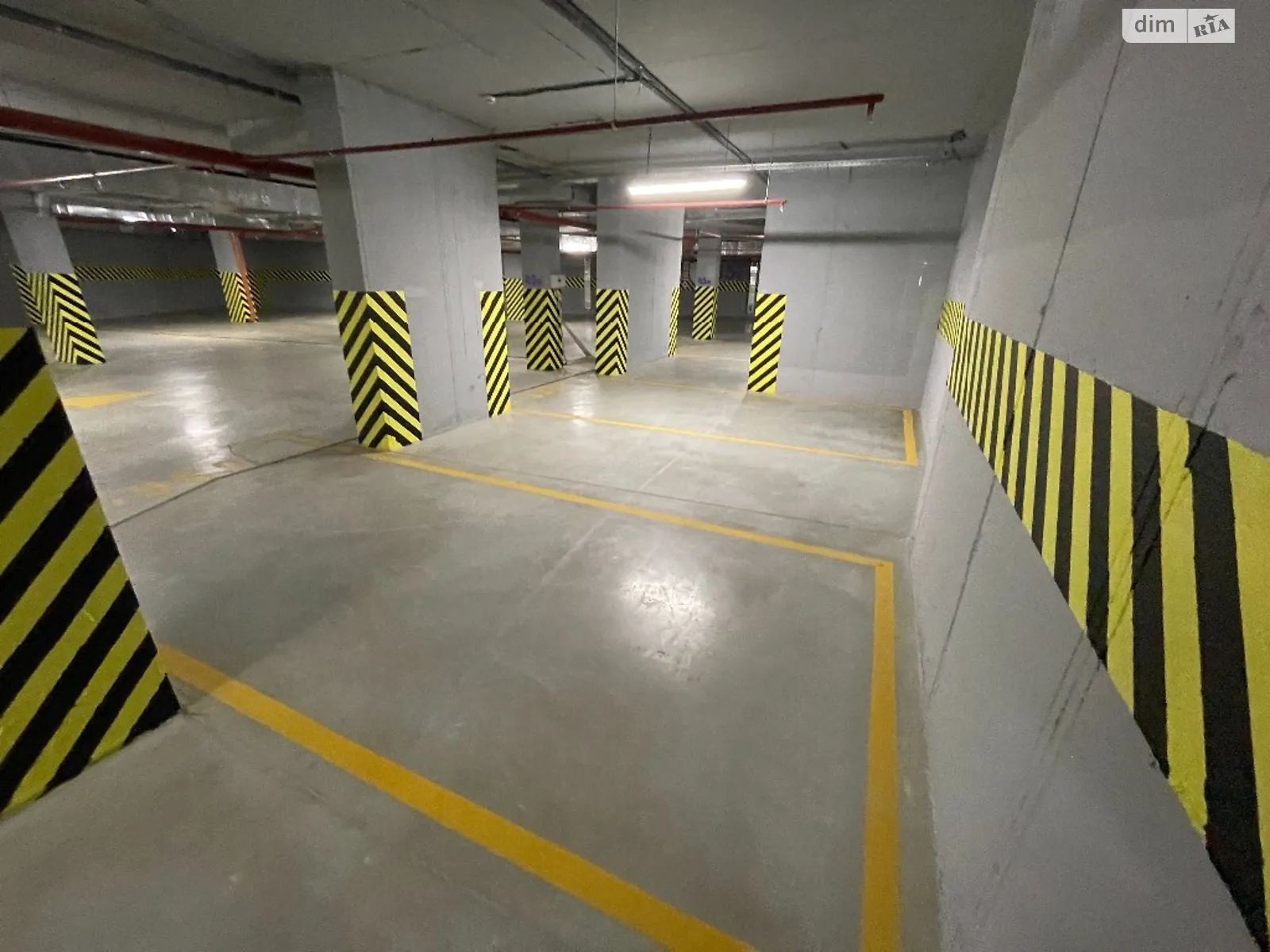 Продается подземный паркинг универсальный на 18 кв. м, цена: 12750 $ - фото 1