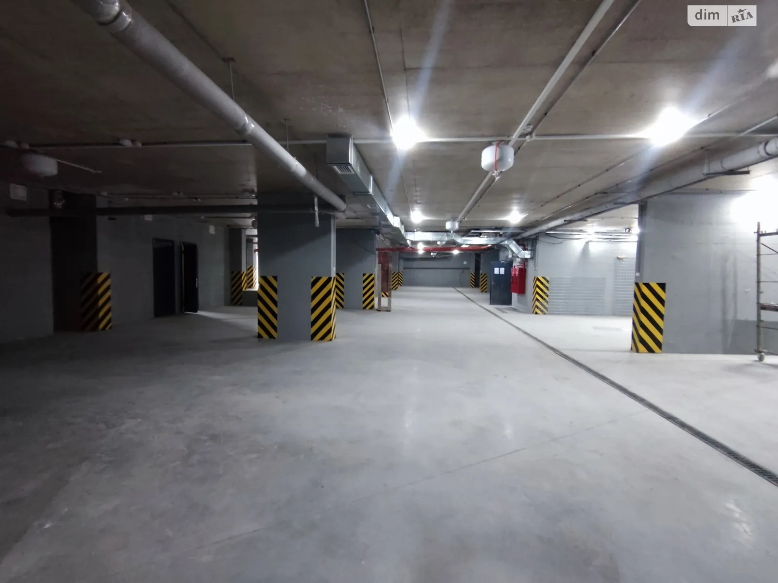 Продается подземный паркинг под легковое авто на 22.7 кв. м - фото 2