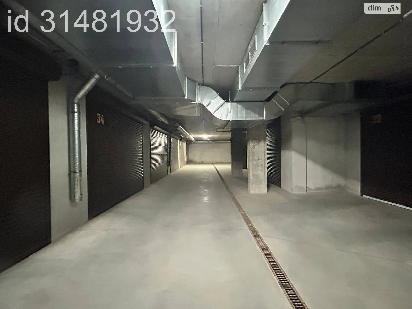 Продается подземный паркинг под легковое авто на 22.7 кв. м - фото 3