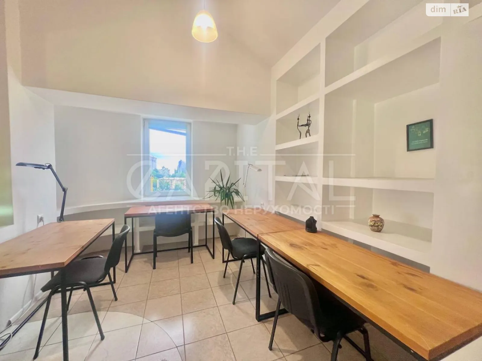 Сдается в аренду офис 82 кв. м в бизнес-центре, цена: 1000 $ - фото 1