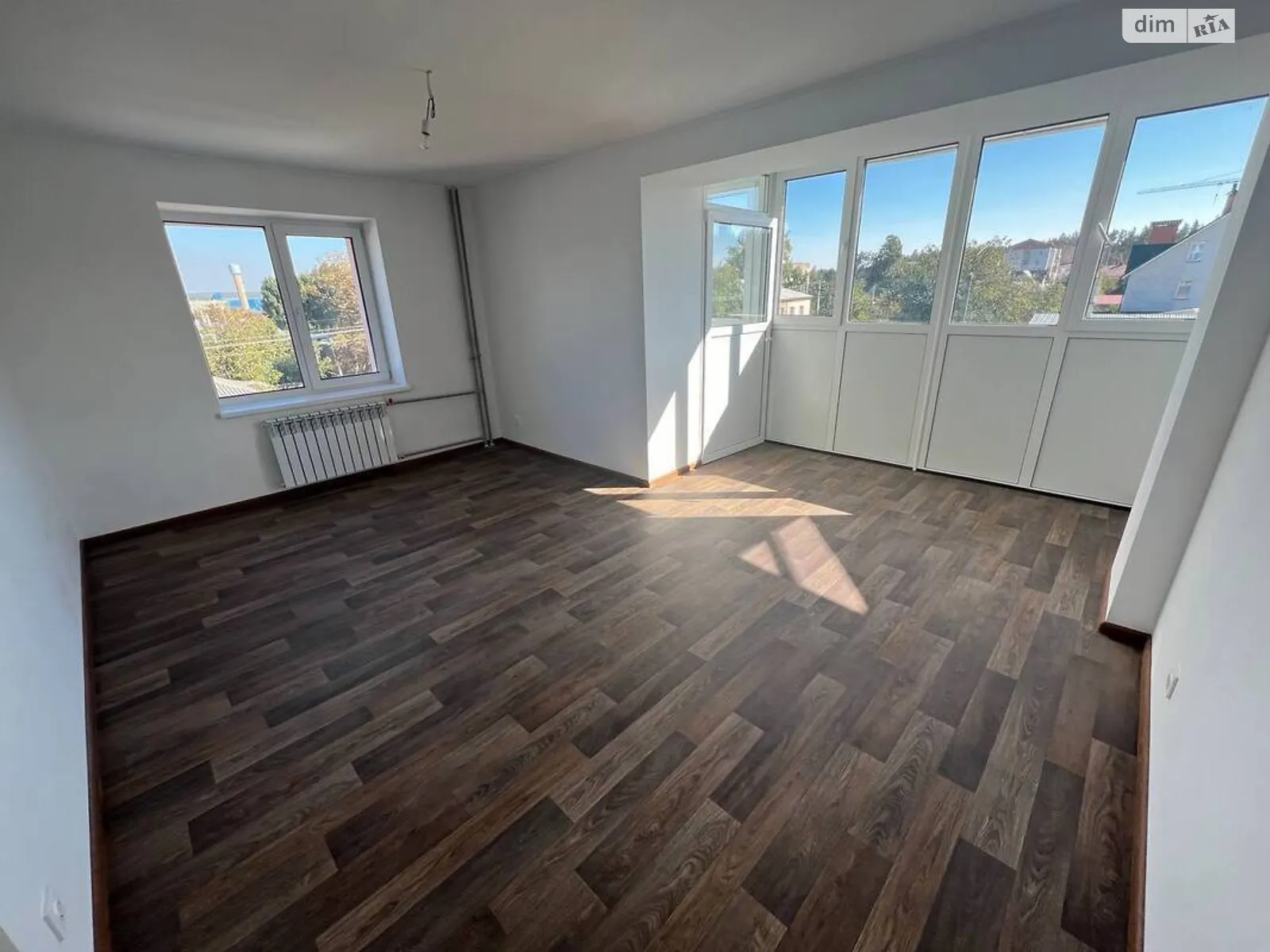 Продается 2-комнатная квартира 57 кв. м в Гостомеле, ул. Рекунова, 1 - фото 1