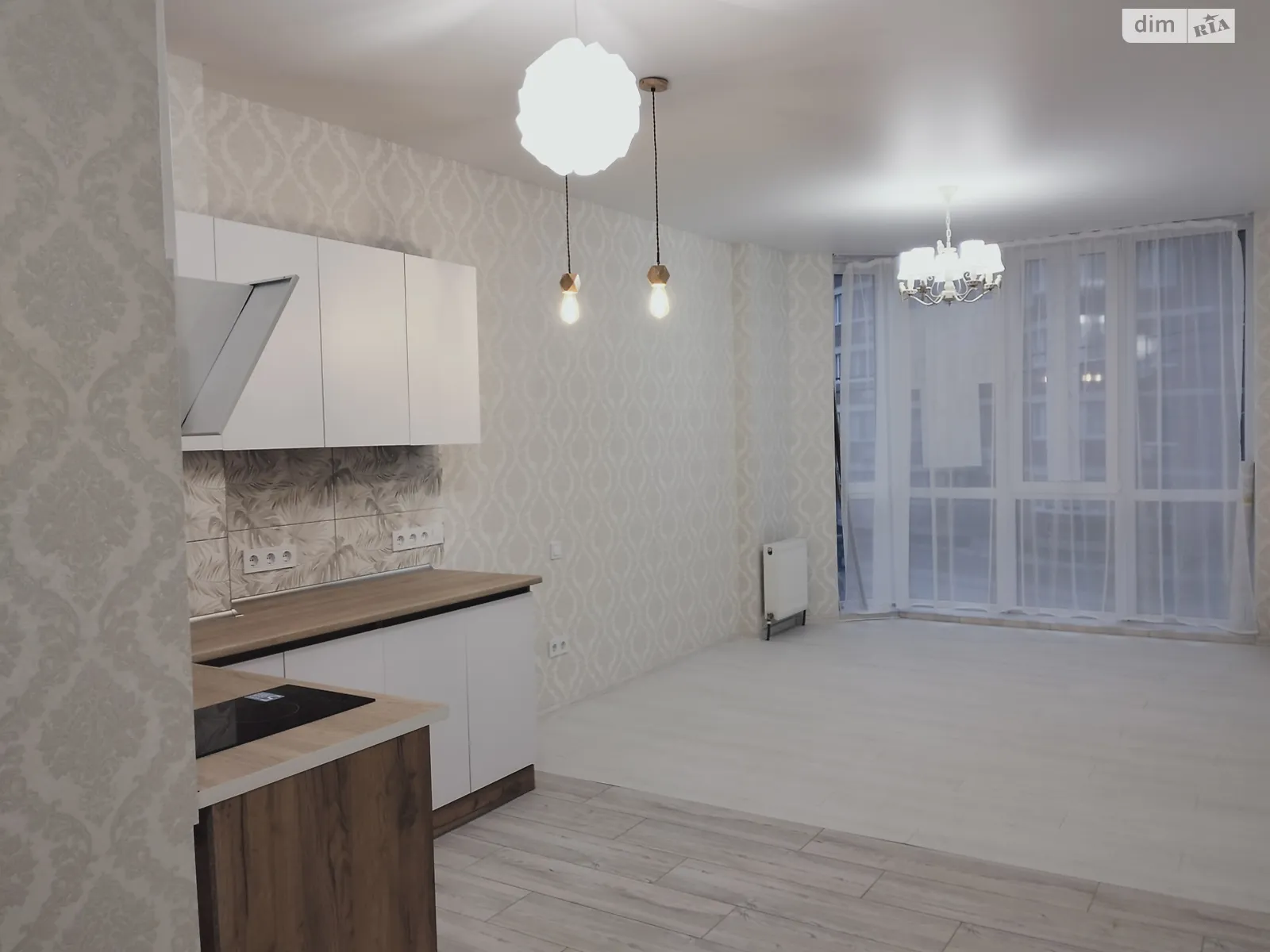 Продается 1-комнатная квартира 27 кв. м в Ильичовке, ул. Паустовского - фото 1