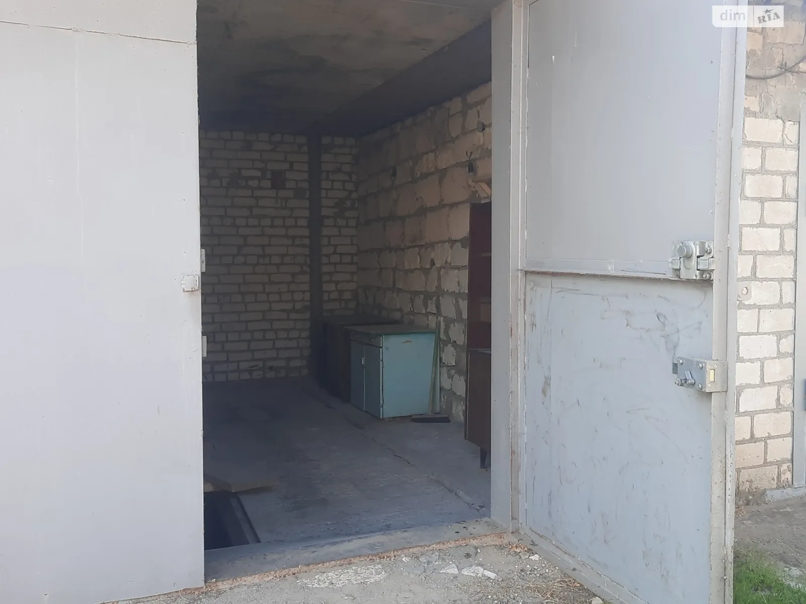 Продается место в гаражном кооперативе под легковое авто на 24 кв. м, цена: 6000 $ - фото 1