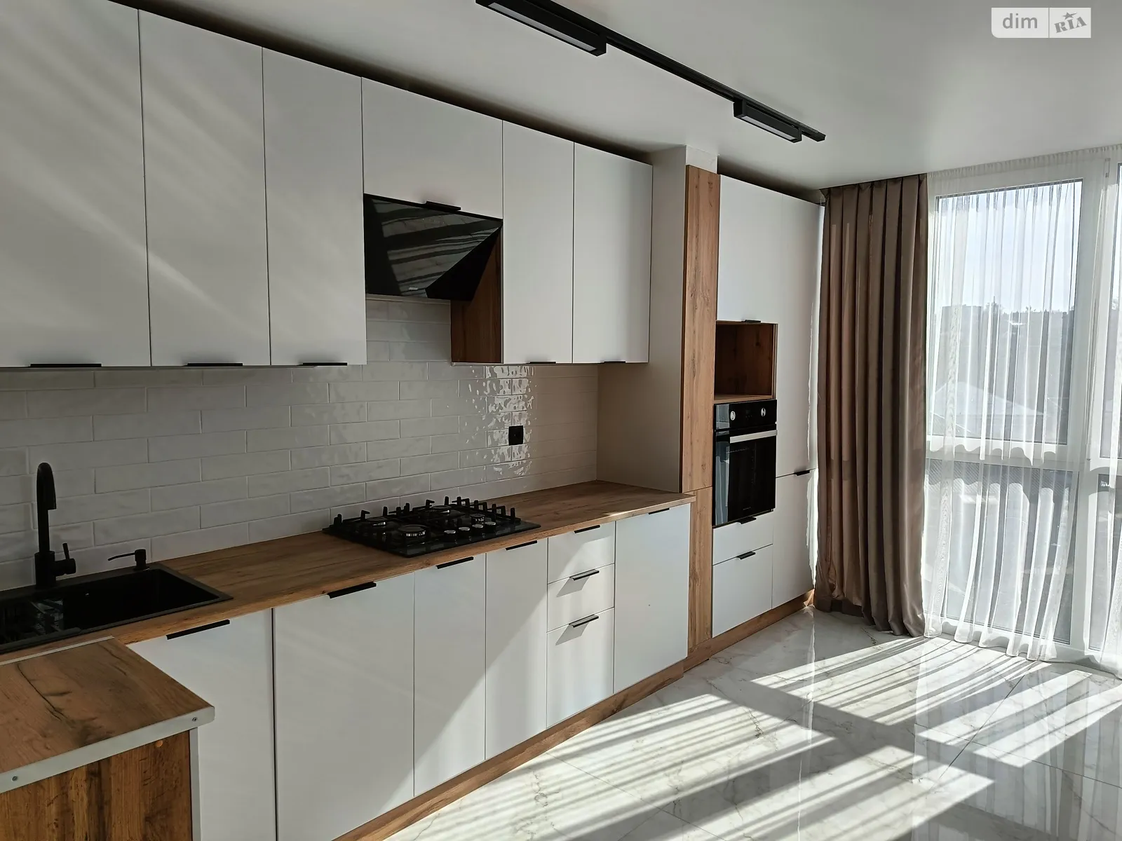 2-кімнатна квартира 58 кв. м у Тернополі, вул. Білогірська, 17 - фото 1