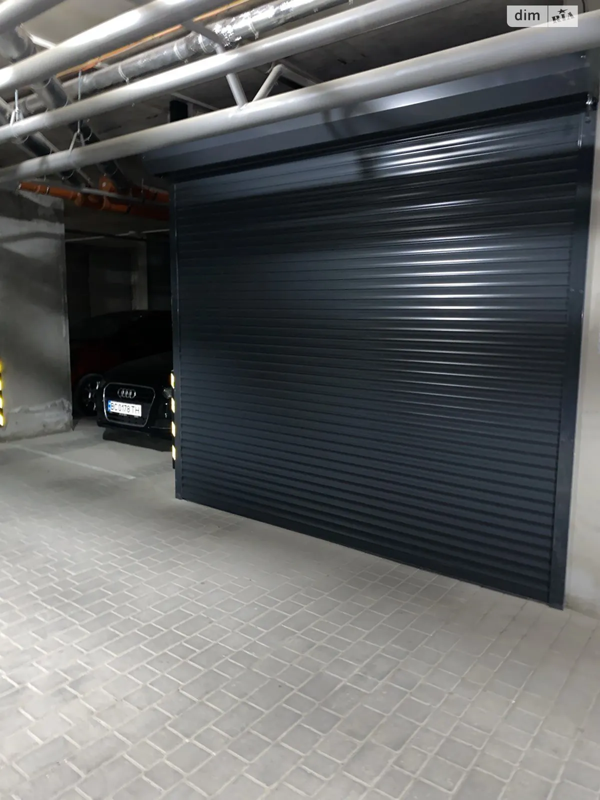 Продается подземный паркинг под легковое авто на 17 кв. м, цена: 17000 $ - фото 1