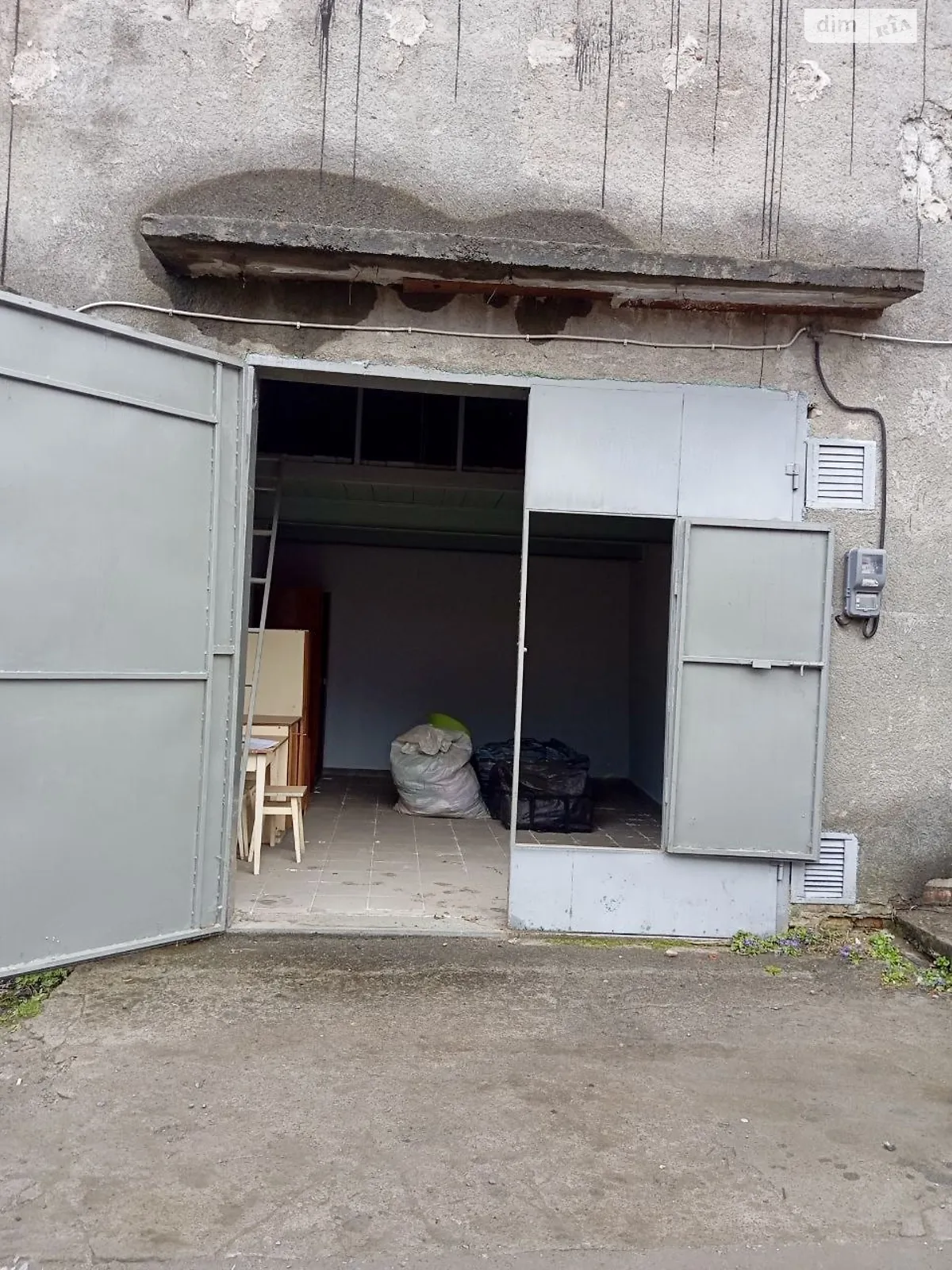 Продается место в гаражном кооперативе универсальный на 21.7 кв. м, цена: 10000 $ - фото 1