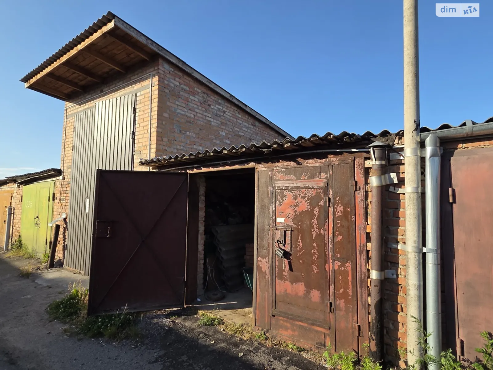 Продается место в гаражном кооперативе под легковое авто на 22 кв. м, цена: 3400 $ - фото 1