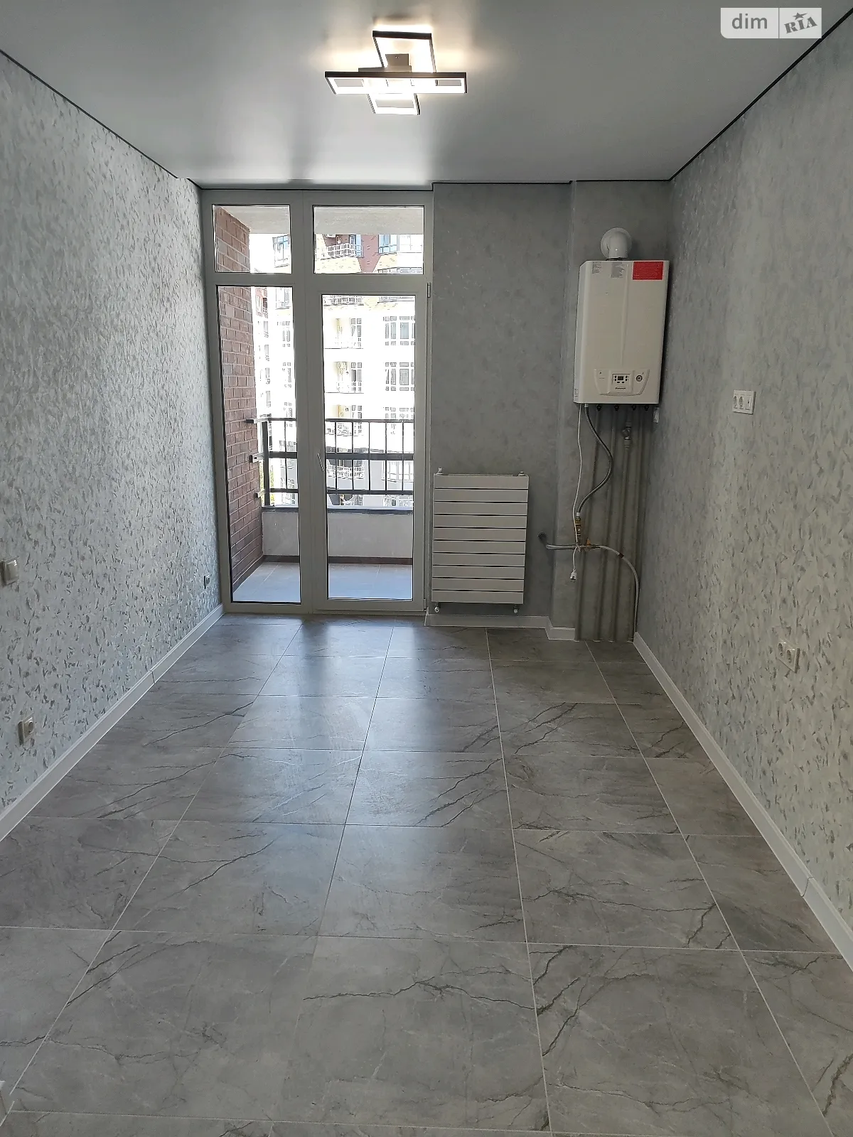 Продается 1-комнатная квартира 40 кв. м в Ирпене, ул. Кобылянской Ольги, 1В/22 - фото 1