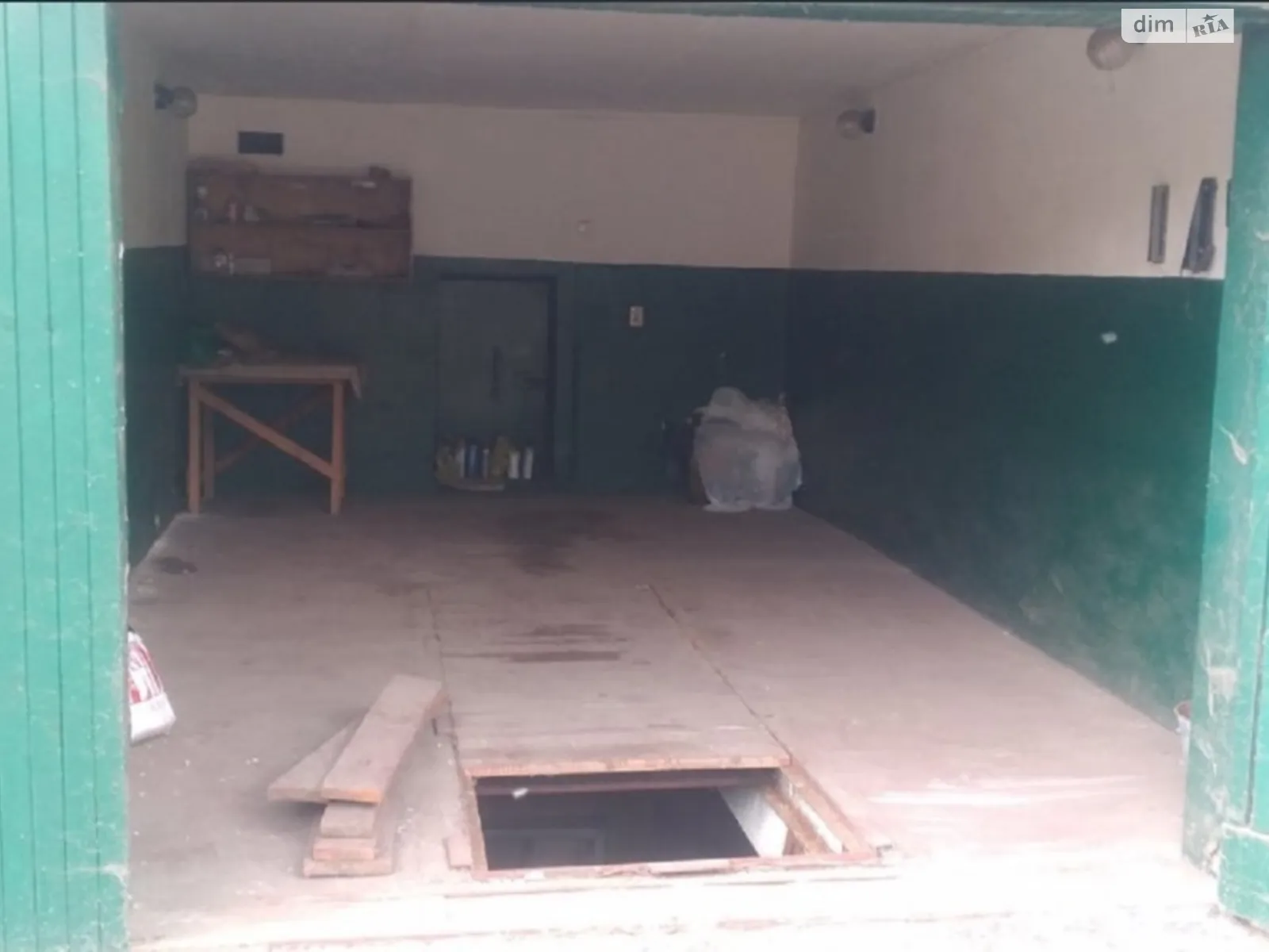 Продается место в гаражном кооперативе под легковое авто на 20 кв. м, цена: 7500 $ - фото 1