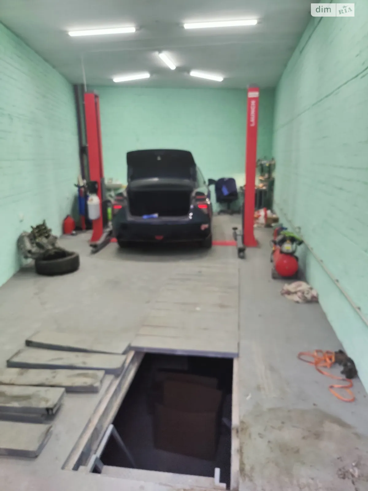 Продается место в гаражном кооперативе универсальный на 130 кв. м, цена: 42000 $ - фото 1