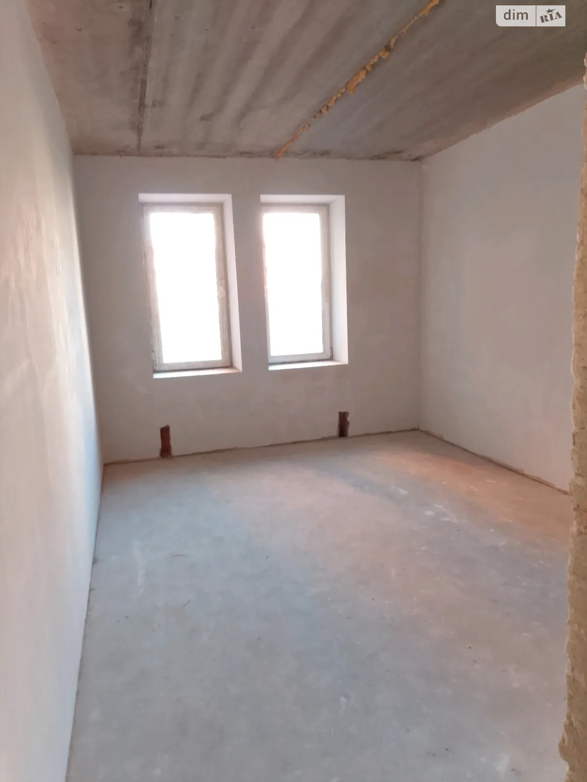 Продається 2-кімнатна квартира 62 кв. м у Бучі, вул. Амосова, 4 - фото 1