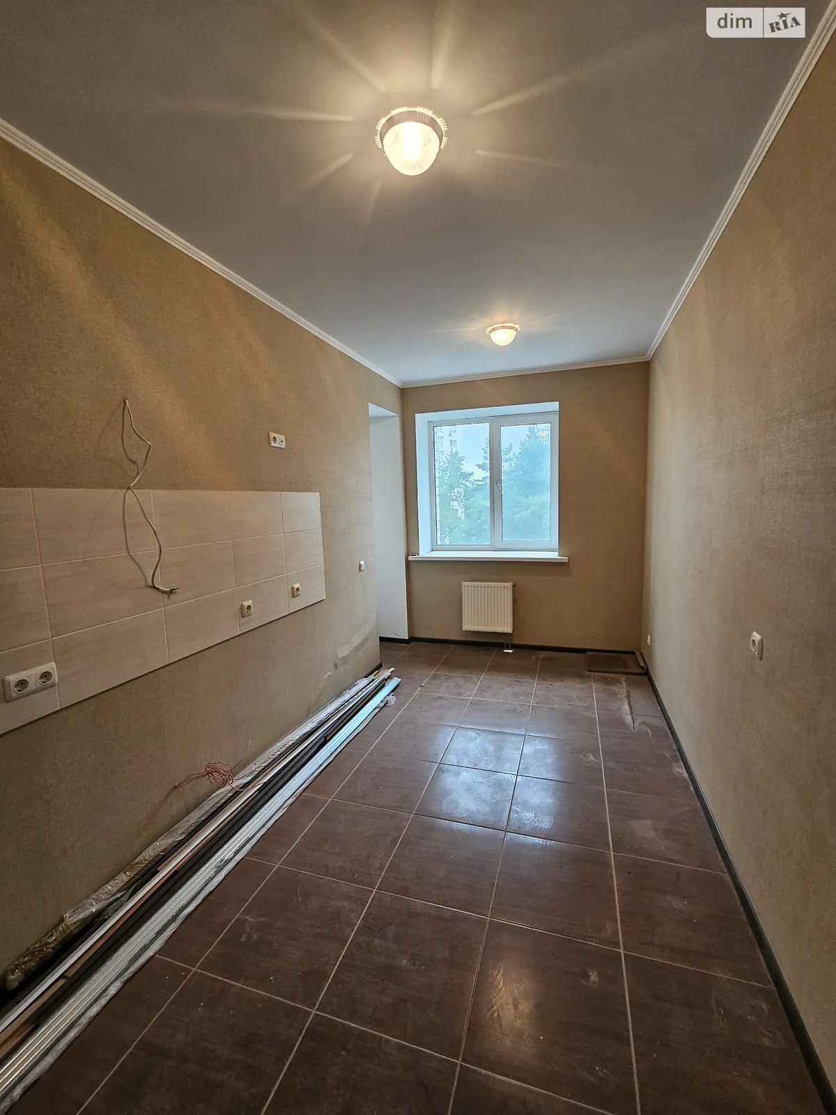 Продается 1-комнатная квартира 41.8 кв. м в Украинке, ул. Строителей, 12 - фото 1