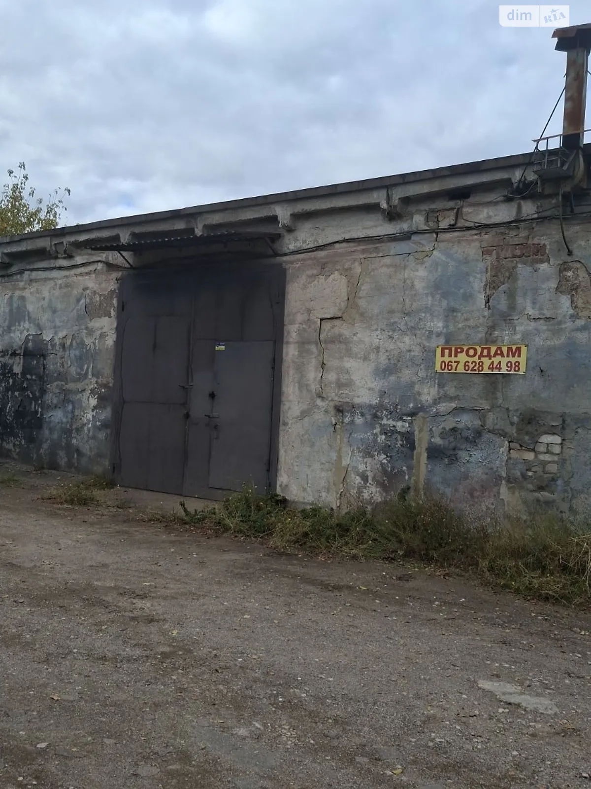 Продается место в гаражном кооперативе под бус на 106 кв. м, цена: 20000 $ - фото 1