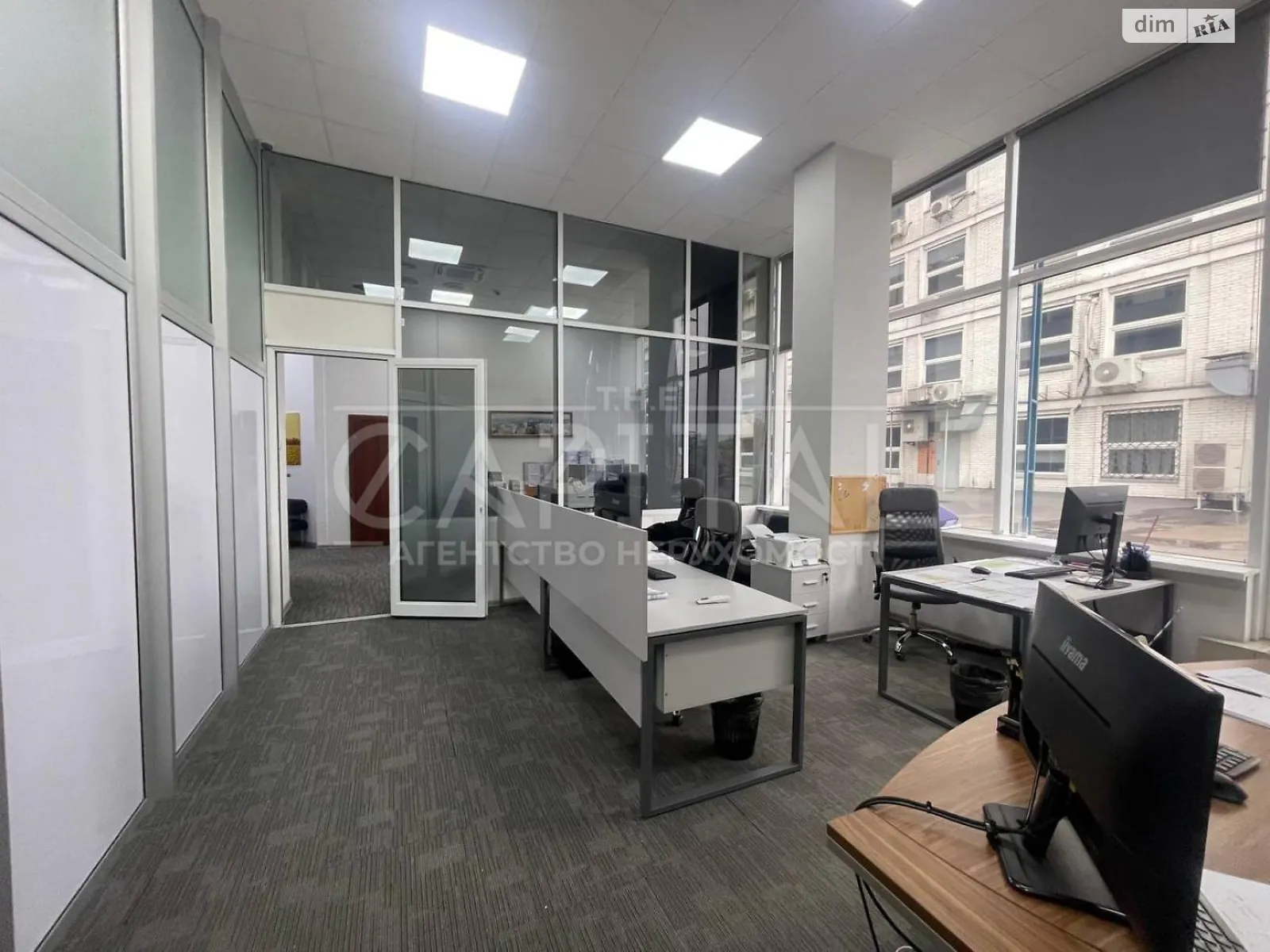 Сдается в аренду офис 120 кв. м в бизнес-центре, цена: 1200 $ - фото 1