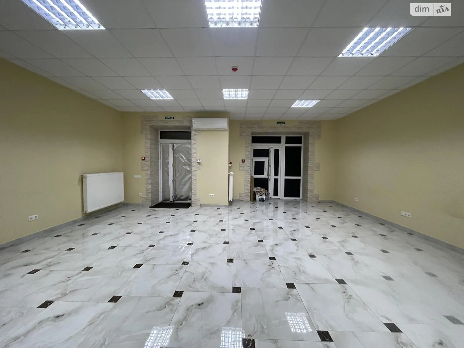 Сдается в аренду помещения свободного назначения 110 кв. м в 10-этажном здании, цена: 45000 грн - фото 1