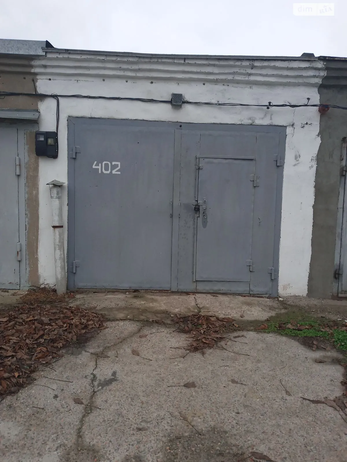 Продается место в гаражном кооперативе под легковое авто на 20 кв. м, цена: 7000 $ - фото 1