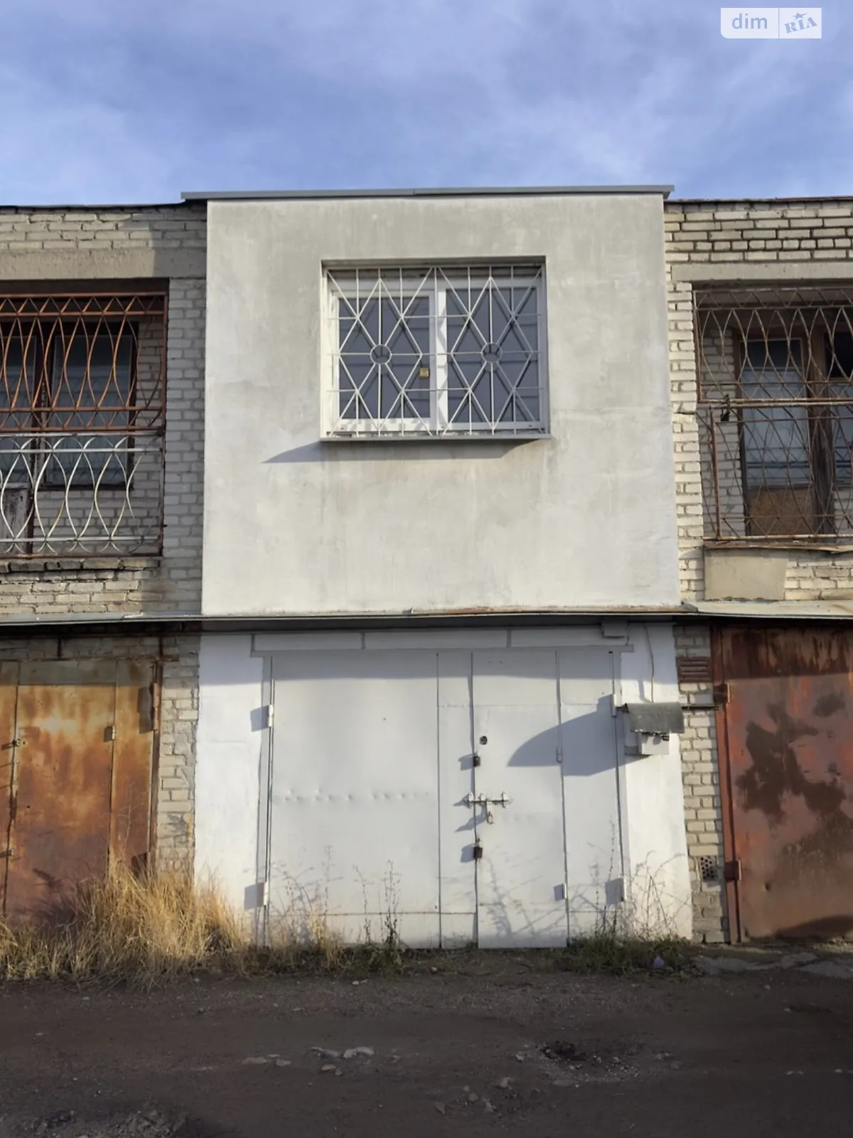 Продается место в гаражном кооперативе под легковое авто на 52 кв. м, цена: 26500 $ - фото 1