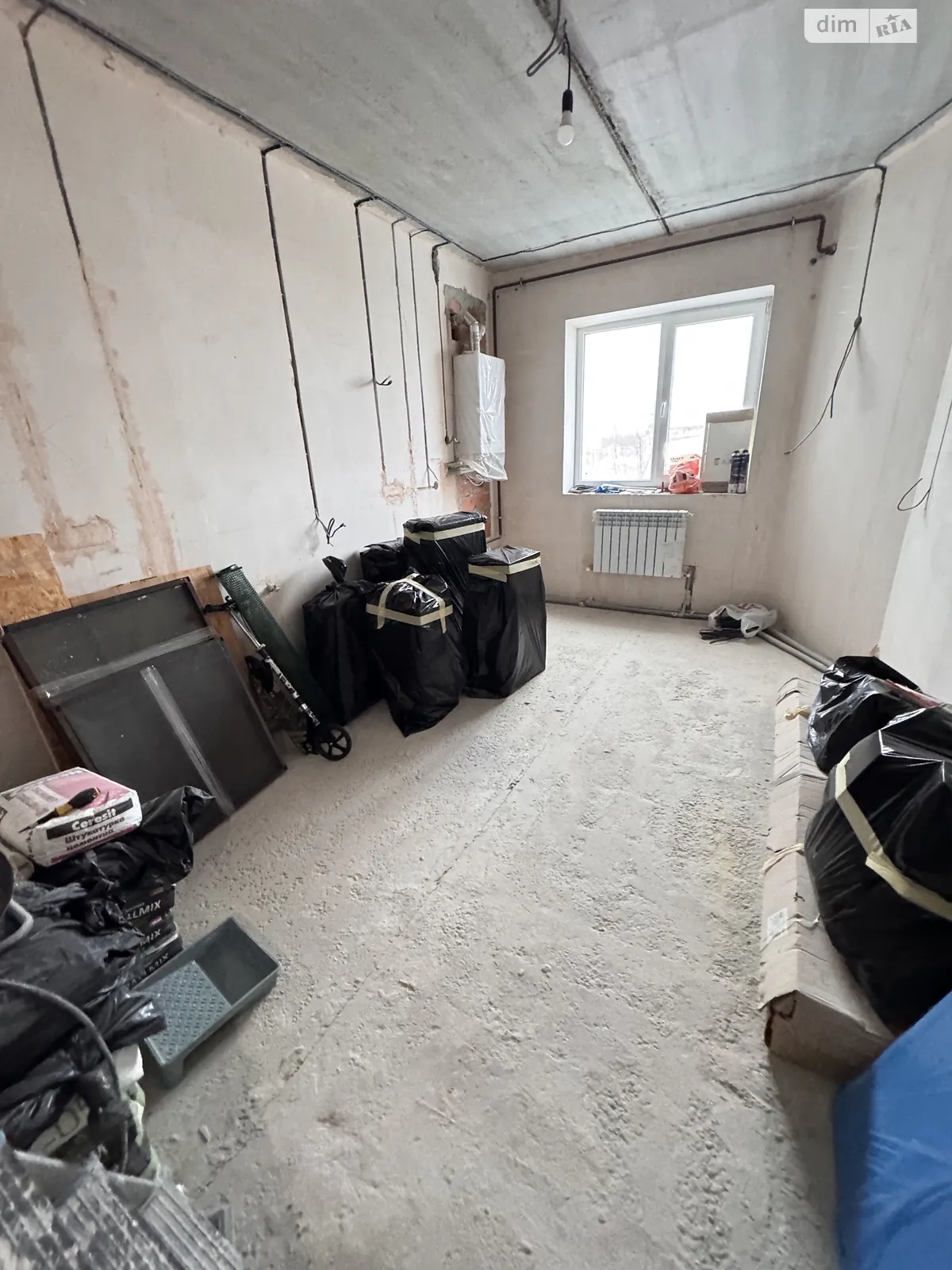 Продается 2-комнатная квартира 52 кв. м в Буче, ул. Яблонская, 318А - фото 1