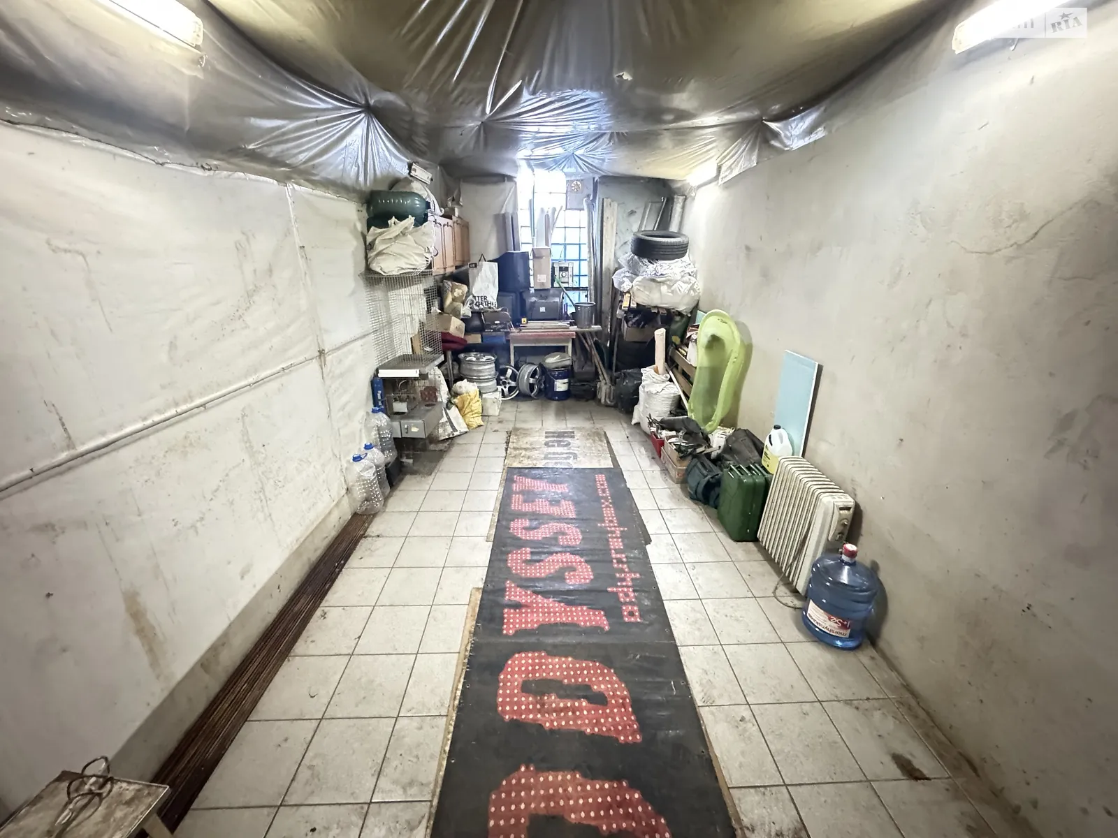 Продается место в гаражном кооперативе под легковое авто на 33.8 кв. м, цена: 22000 $ - фото 1