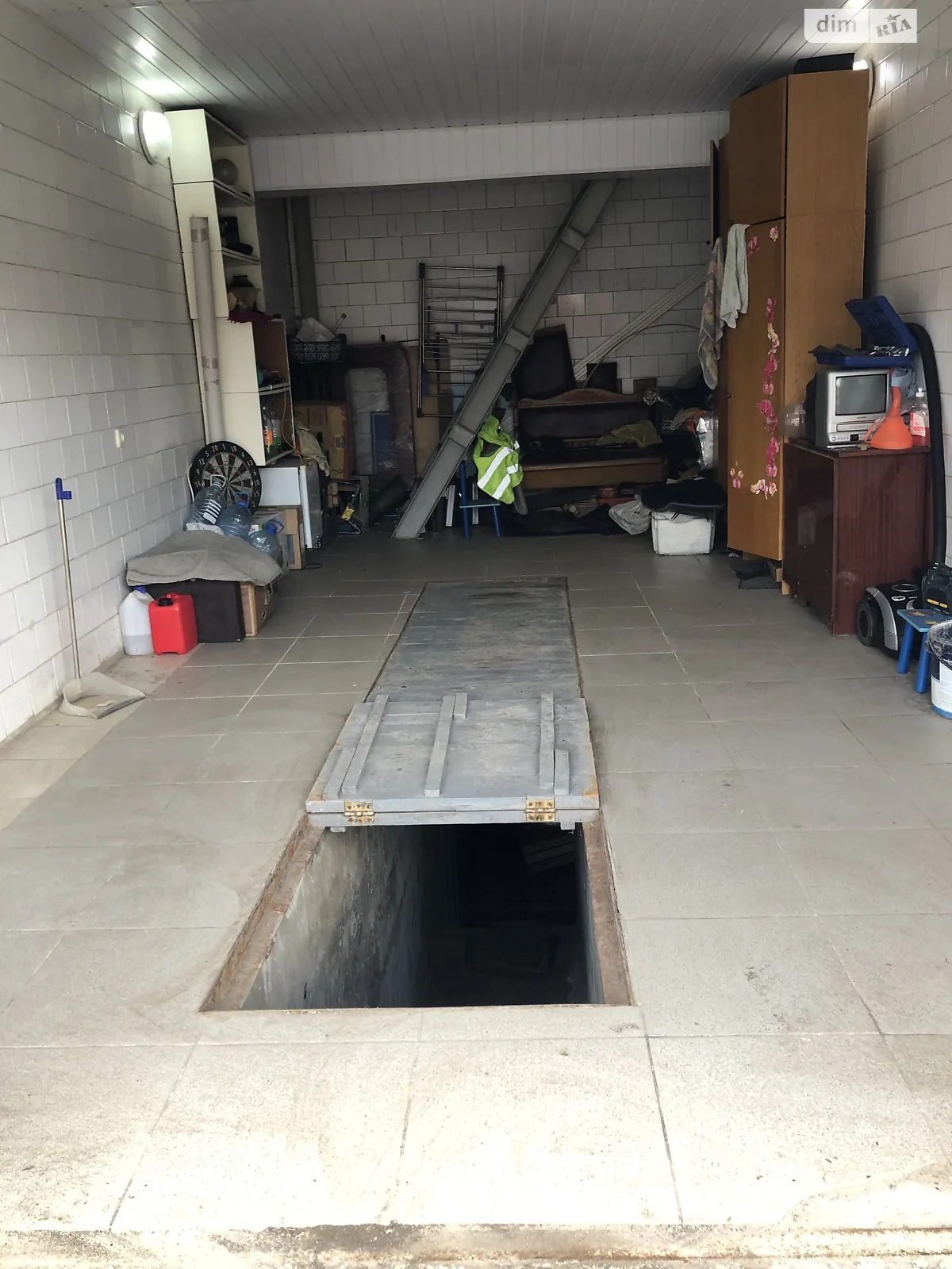 Продается место в гаражном кооперативе под легковое авто на 55.8 кв. м, цена: 11000 $ - фото 1