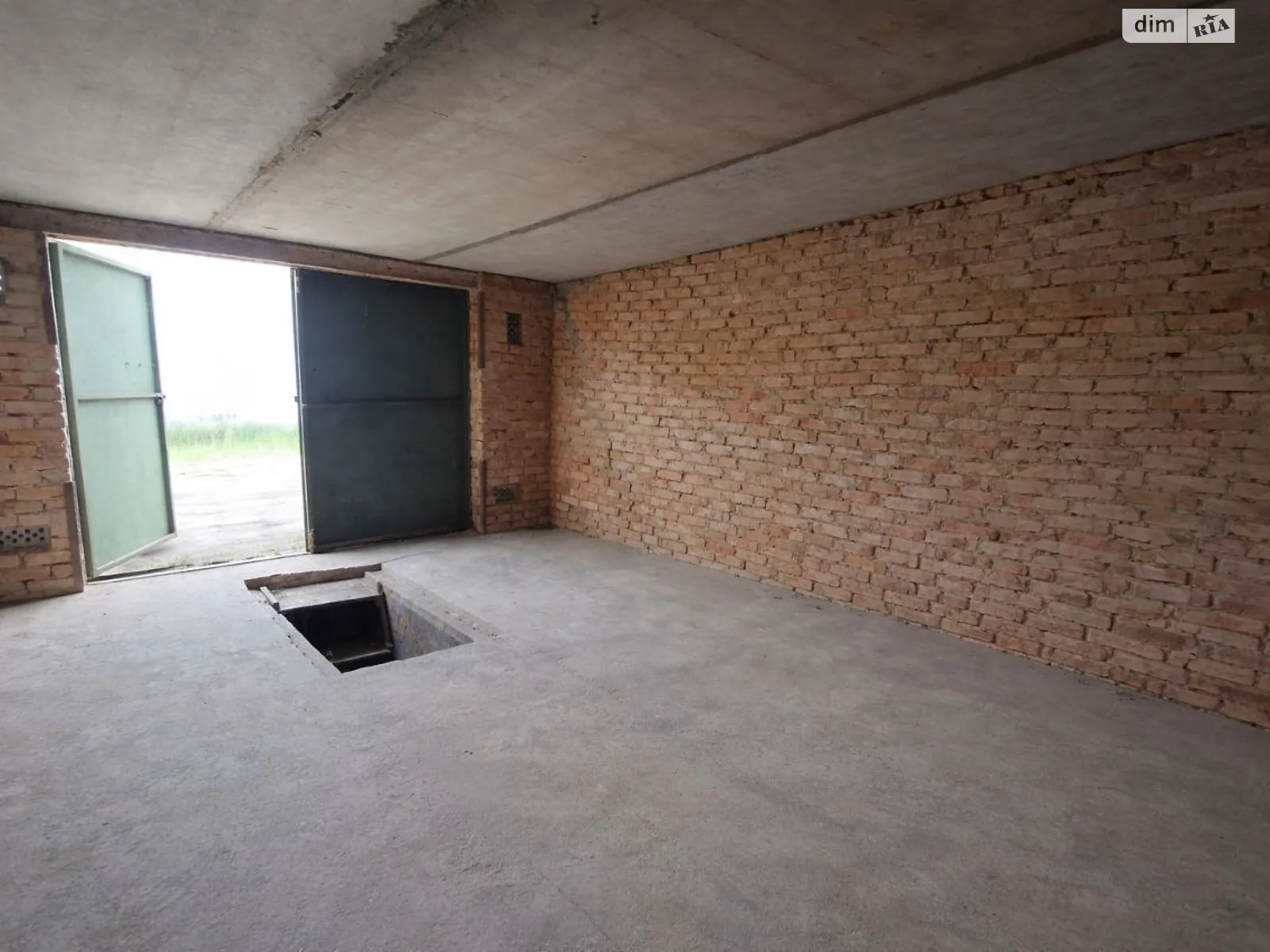 Продается место в гаражном кооперативе под легковое авто на 24 кв. м, цена: 5500 $ - фото 1