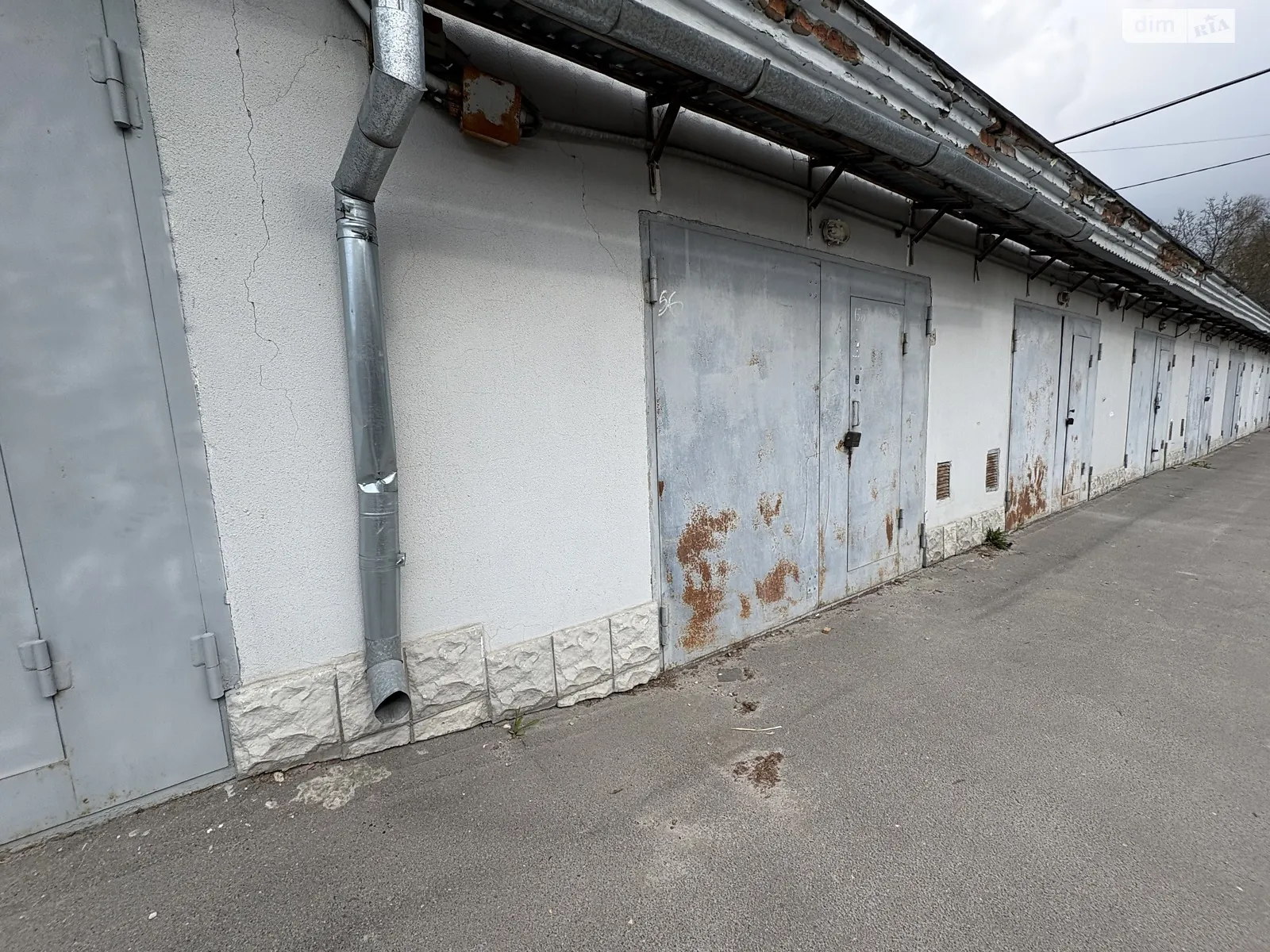 Продается место в гаражном кооперативе под легковое авто на 38 кв. м, цена: 15500 $ - фото 1