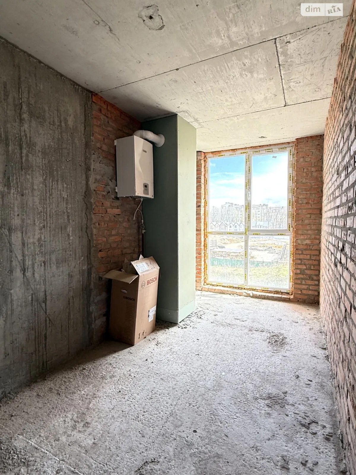 Продается 1-комнатная квартира 32 кв. м в Крюковщине, ул. Богуславская, 2 - фото 1