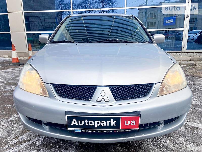Головне фото звіту автомобіля MITSUBISHI LANCER 2006