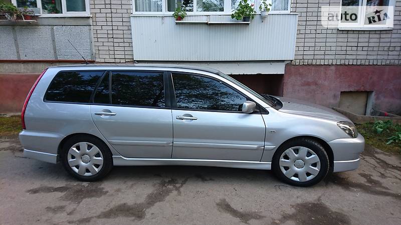 Головне фото звіту автомобіля MITSUBISHI LANCER 2006