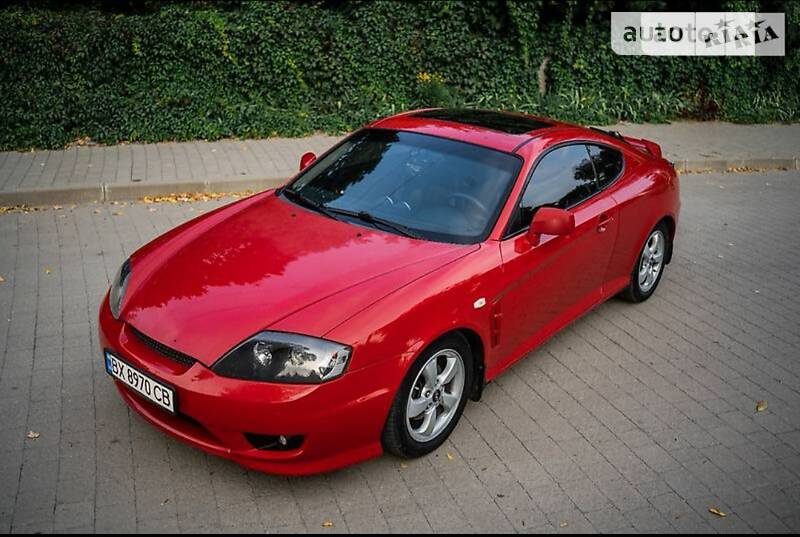 Головне фото звіту автомобіля HYUNDAI COUPE 2006