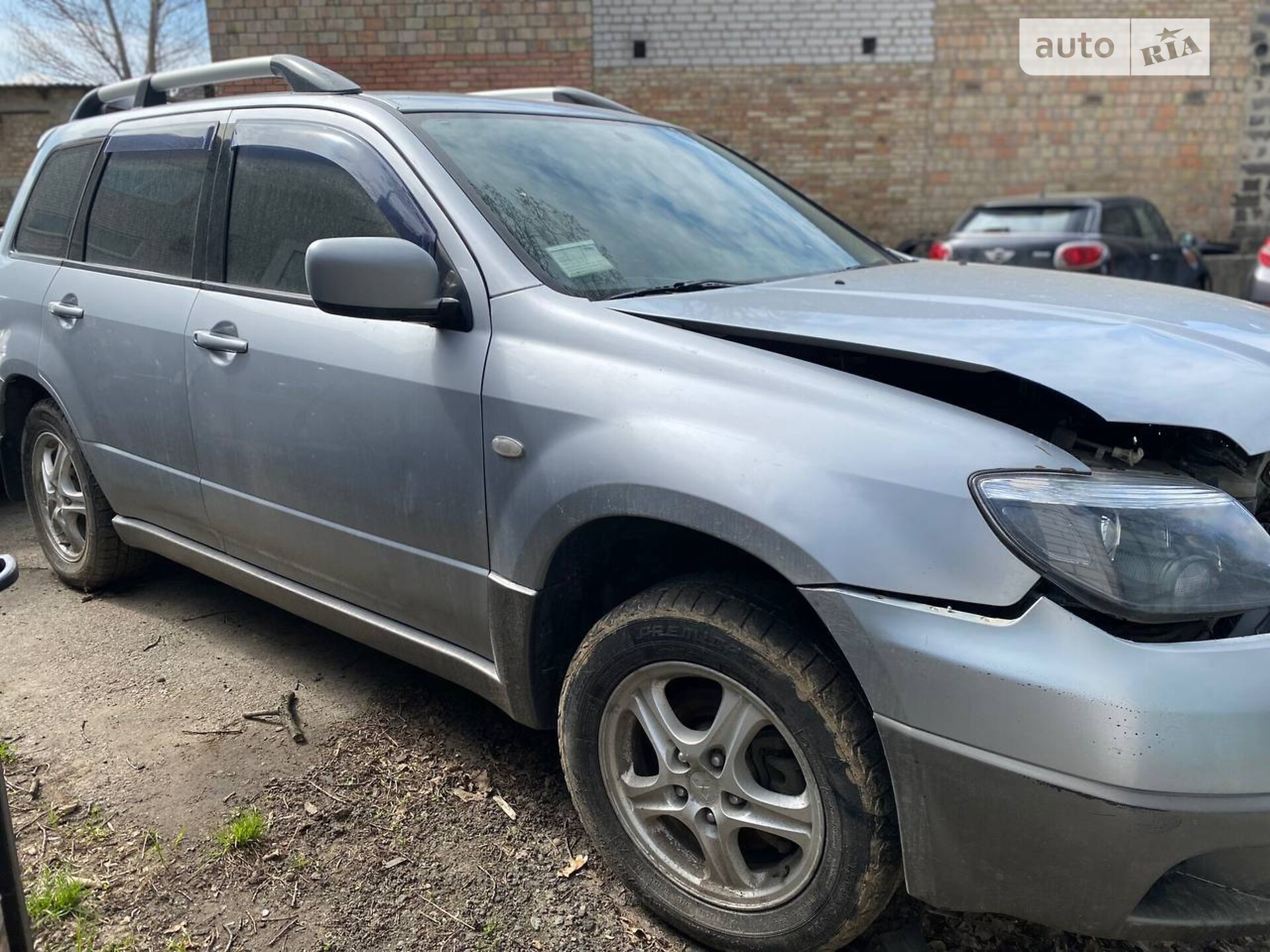 Головне фото звіту автомобіля MITSUBISHI OUTLANDER 2004