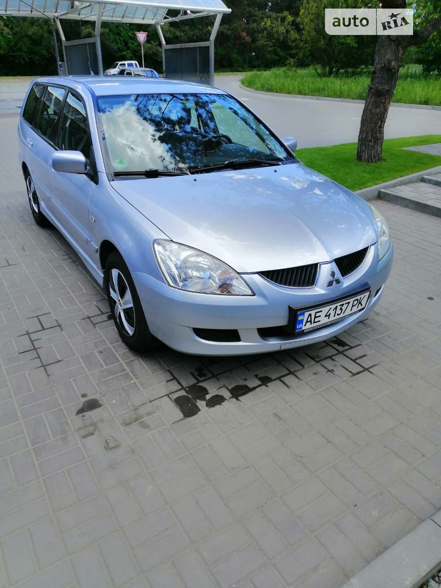 Головне фото звіту автомобіля MITSUBISHI LANCER 2004