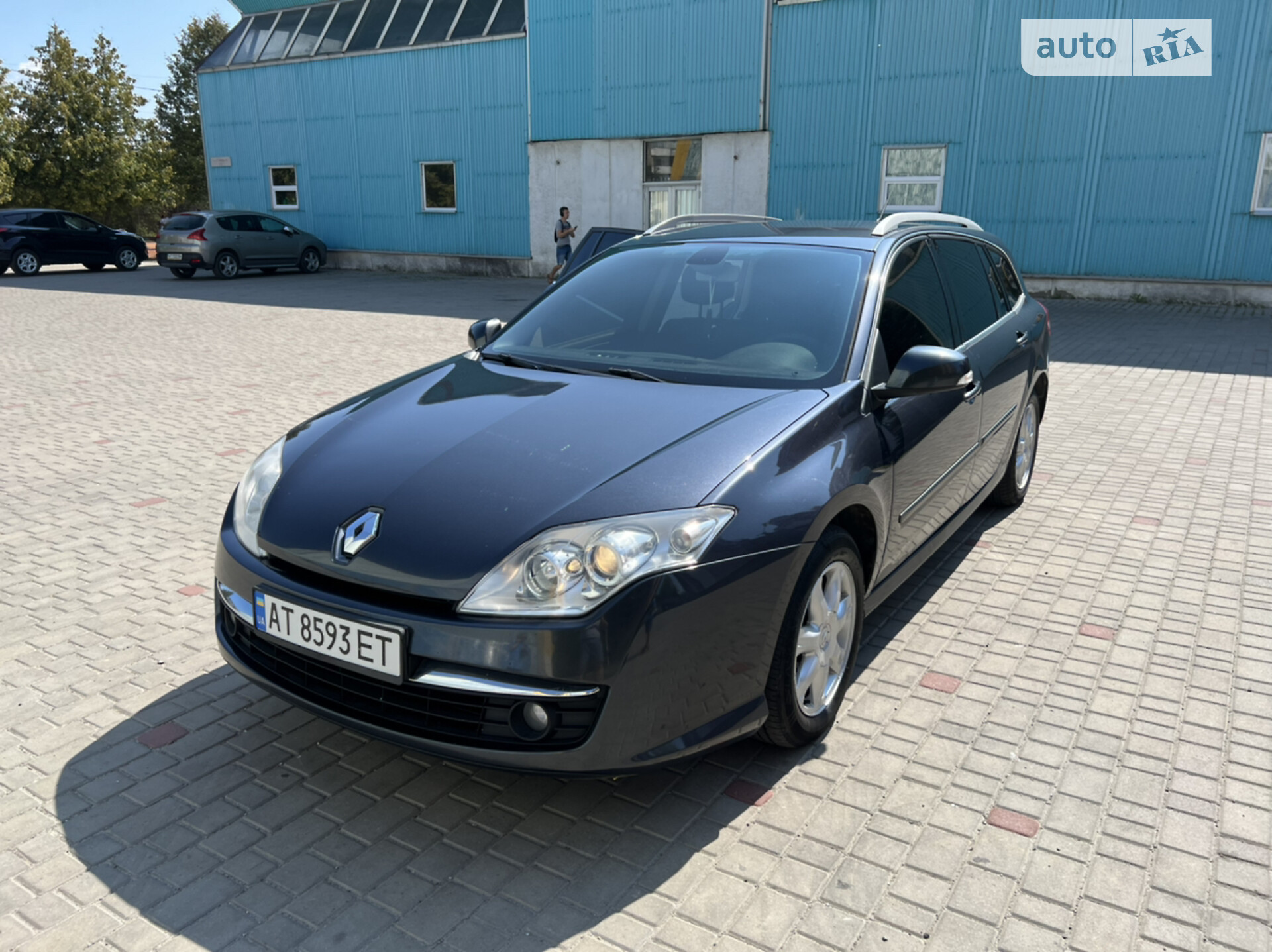 Головне фото звіту автомобіля RENAULT LAGUNA 2010
