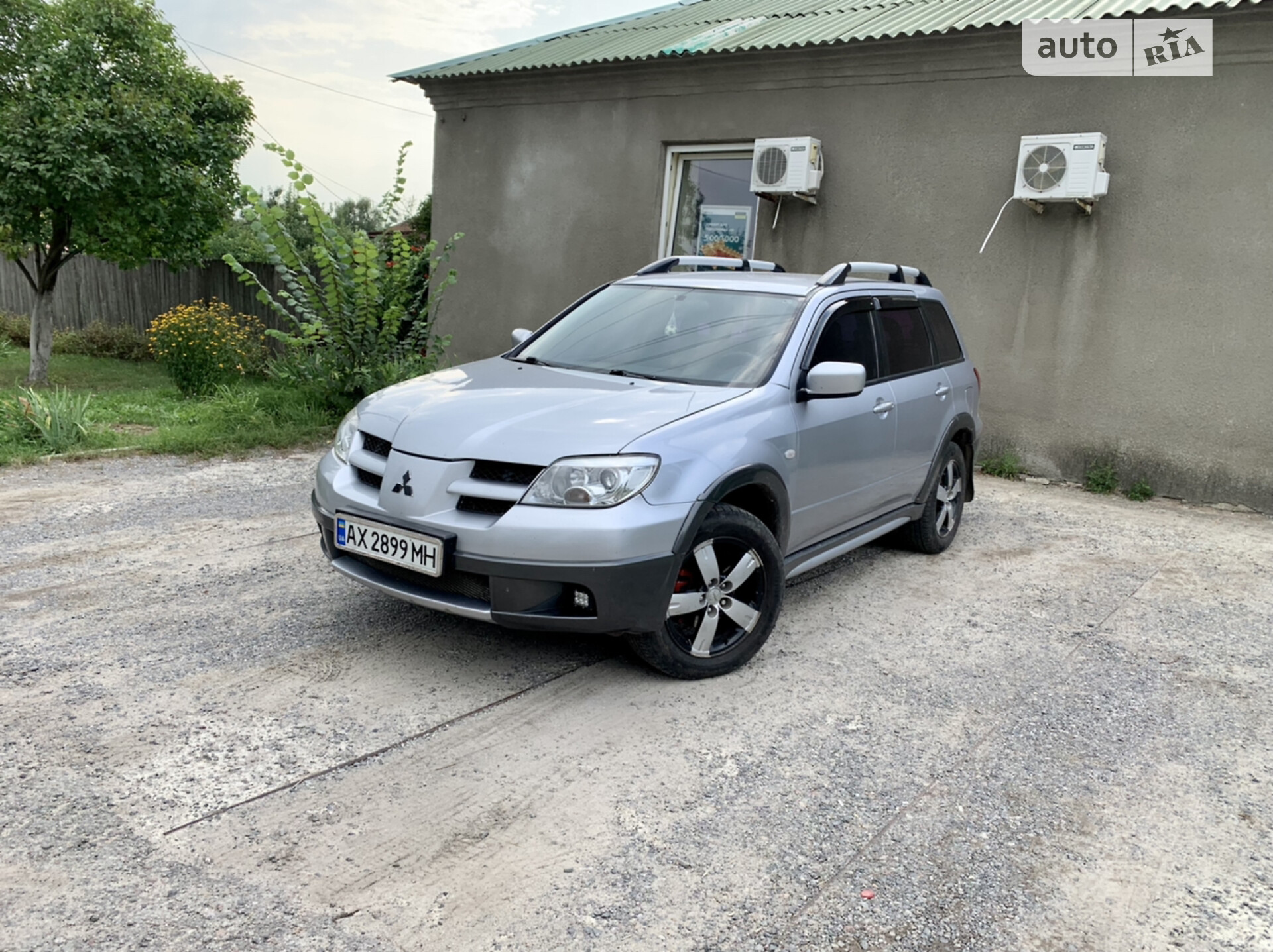 Головне фото звіту автомобіля MITSUBISHI OUTLANDER 2006