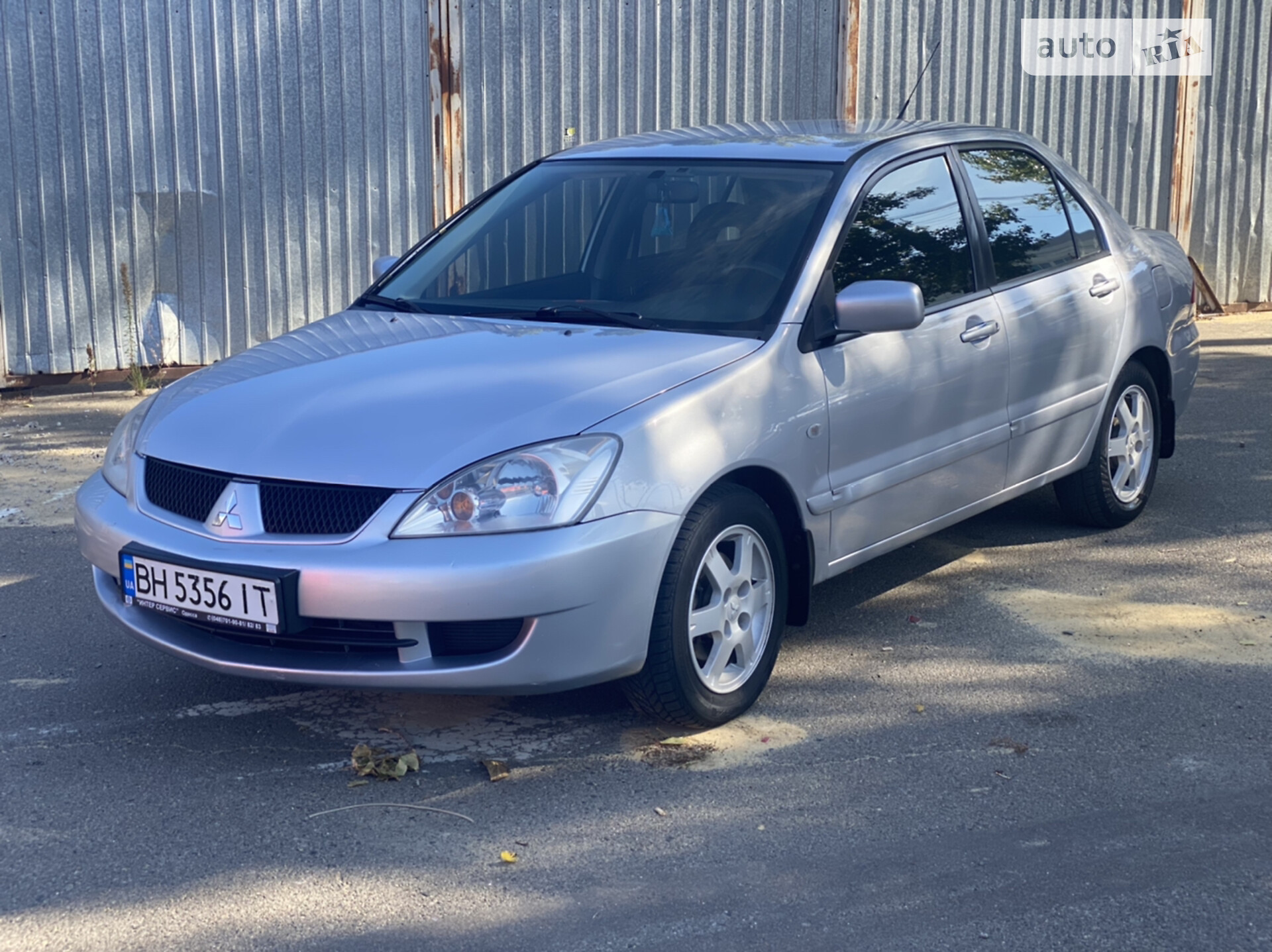 Головне фото звіту автомобіля MITSUBISHI LANCER 2007