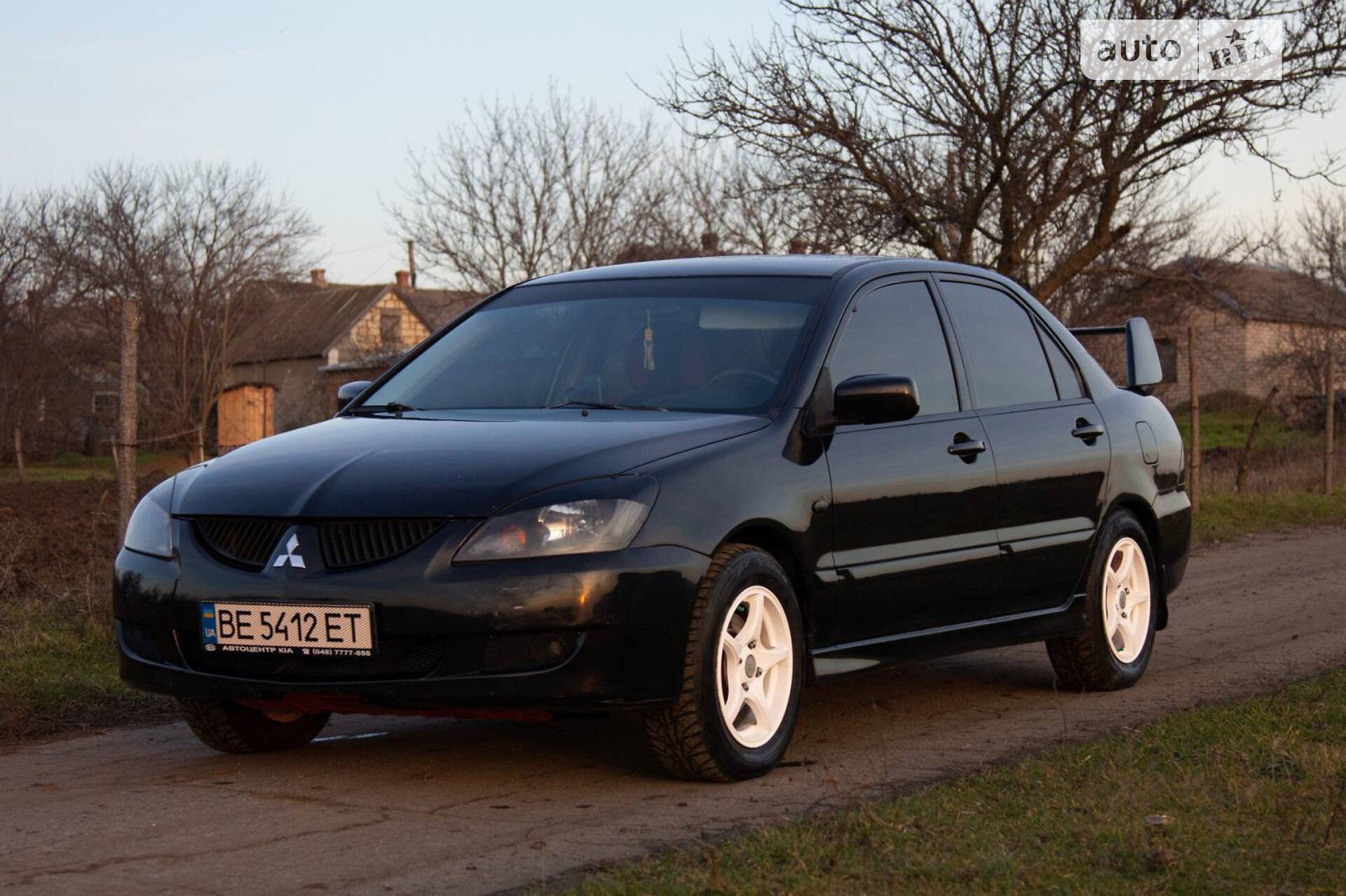 Головне фото звіту автомобіля MITSUBISHI LANCER 2006