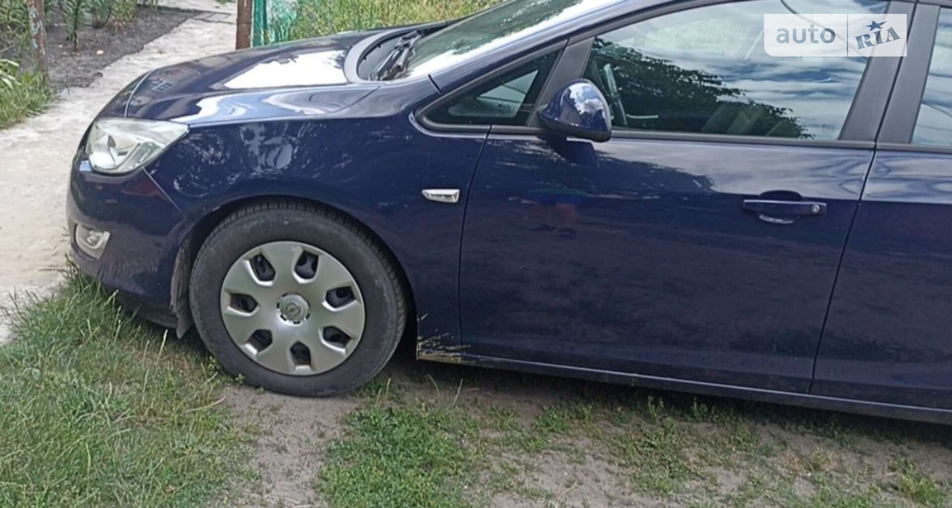 Головне фото звіту автомобіля OPEL ASTRA 2012