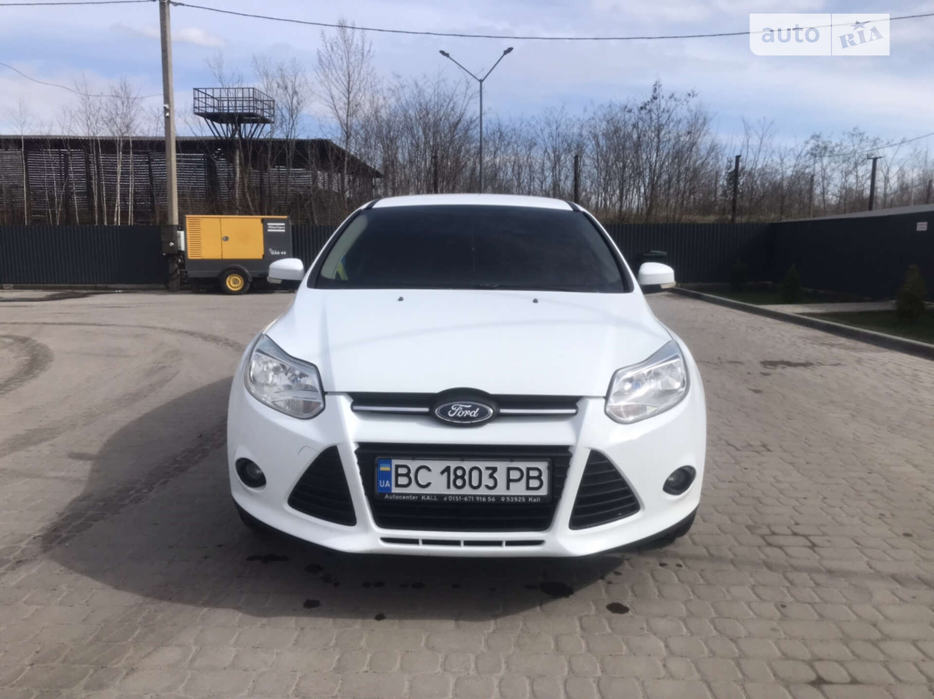 Головне фото звіту автомобіля FORD FOCUS 2011
