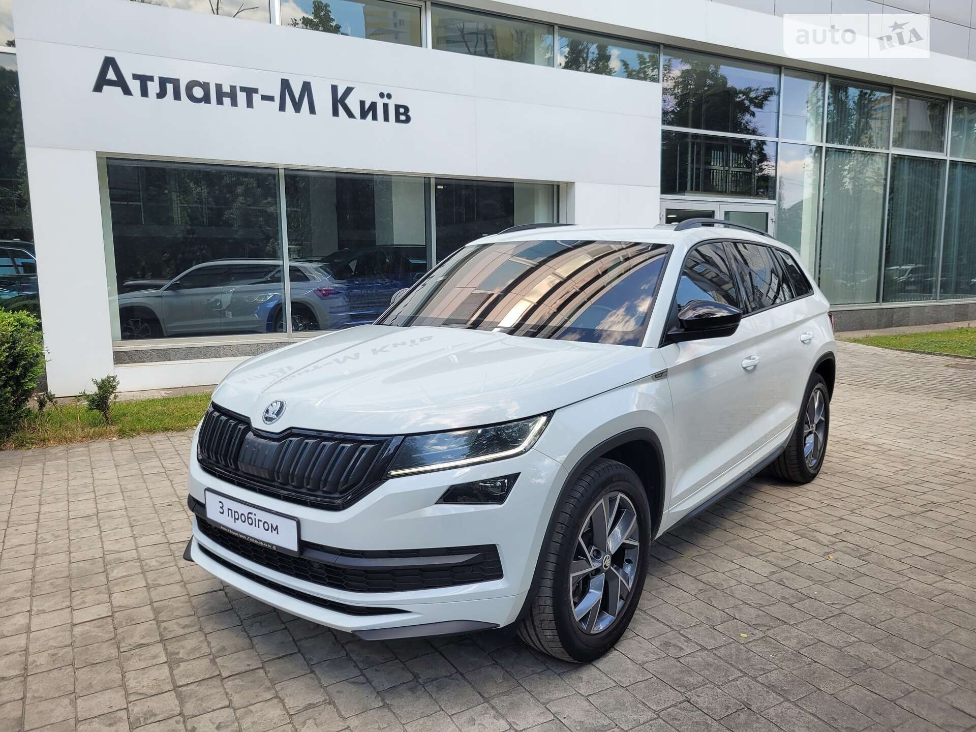 Головне фото звіту автомобіля SKODA KODIAQ 2021